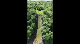 Daredevils chase down steep slope in UK's thrilling cheese-rolling event