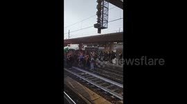 Pro-Palestine protesters occupy train station in Bologna