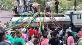 Locals scramble to collect drinking water as Delhi records temperature of over 50 degrees Celsius