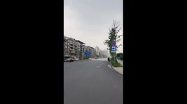 Rain falls on only half of the road in China
