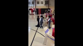 Miniature Gentleman Pushes Lady's Chain In