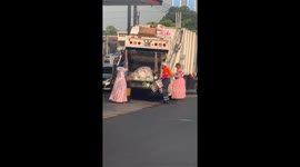 Trash Collectors Rock Pretty Pink Dresses