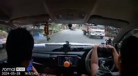 Passing Truck Sends Stray Rock Flying Into Windshield