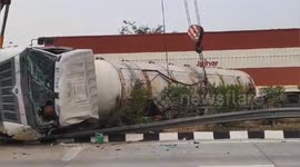 Tanker transporting acid overturns on highway in northern India