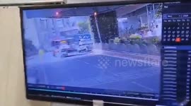 A speeding car jumps a red signal and hits a bike severely injuring two on the bike on South India