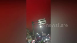 Night sky turns blood red due to 'fishing boat lights' in China