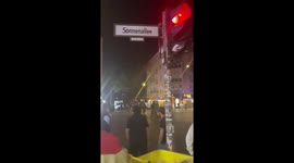 Pro-Palestine protesters burn items on Sonnenallee in Berlin amid Israel-Gaza conflict