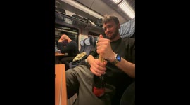 Train mishap: bottle pop, fizzy froth, and laughter