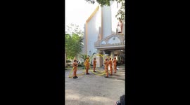 Fireman gets married with hoses forming a tunnel outside church