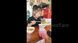 China: The Little Girl and Her Noodle Mishap