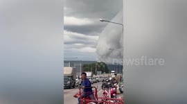 Eerie clouds appear over road in Thailand
