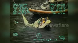 USA: Coast Guard Races Against Time to Rescue Sailor from Sinking Sailboat off Grand Haven