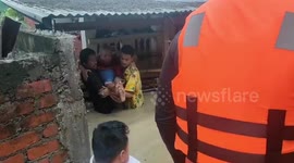 Rescue team saves 90-year-old woman from floods caused by Cyclone Remal in northeastern India
