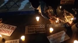 Indonesia: People pray and light candles as a form of solidarity and support for the Palestinian people in Bandung 8
