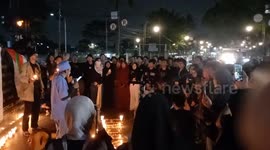Indonesia: People pray and light candles as a form of solidarity and support for the Palestinian people in Bandung 2