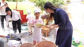 Children learn cooking skills at Kindergarten in China