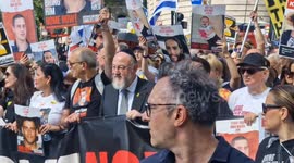Chief Rabbi Ephraim Mirvis leads march for Israel hostages in London as thousands attend