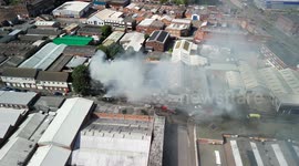 FIFTY firefighters tackle industrial blaze as explosions are heard near Birmingham city centre