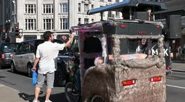 Music from a Land Rover in Oxford Street, London, United Kingdom