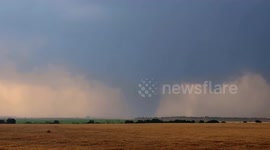 Storm Chaser Captures Moment When Two Large Tornadoes Touch Down Near Eldorado, Oklahoma Spectacular Footage of Two Large Tornadoes Near Eldorado, Oklahoma - May 23rd