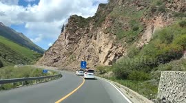 China: Vehicles travel along the Dushanzi to Kuqa highway in Yili