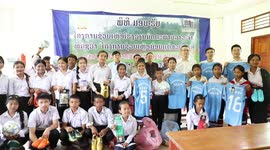 China-aided football field handed over to Laos