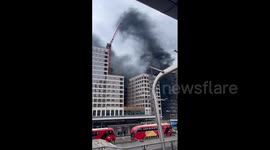 UK: Thick Black Smoke Fills Sky As Blaze Erupts In Canning Town