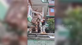 Indian Army Officer save infants and kids from flooded house in northeastern India