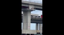 Future olympians! Children dive into river from 50ft high motorway bridge