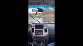 Dirty Car Crosses River To Get Clean