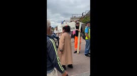 This is in Clacton on sea. Nigel Farage launching his Election campaign. Interview with members of the public about a protest banner not wanting him there.
