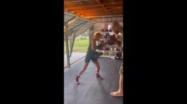 11 year old valu hitting the mitts with dad
