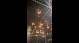 Fireworks debris sets alight food stall roof as display goes awry