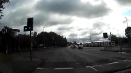 Dash Cam as car runs a red light