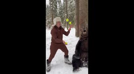 Man Entertains Bear By Juggling