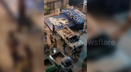 India: Billboard collapse causes panic: vehicles damaged, passersby scared