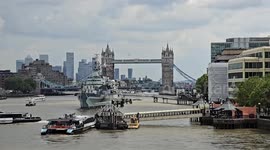 HMS Belfast firing it's guns for D-day celebrations in London