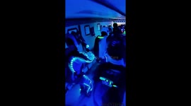 Thrill seekers light up night sky with pyro sparks and LEDs in daring skydive