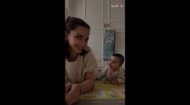 Baby girl's mesmerized gaze writes a silent ode to her mom