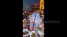 Chinese woman's birthday surprise for father floats away as balloon carries cash