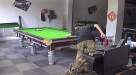 Sandal flies off snooker player's foot and hits him on head