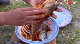Rustic trout feast cooked in the mountains of Skardu