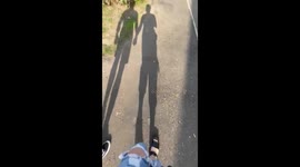 Guy realizes the perils of dating a prankster after being shoved into a bush during scenic seaside walk