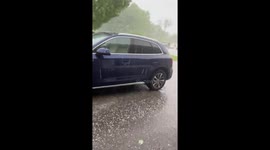 Nickel to quarter-sized hail pelts Dover, NH