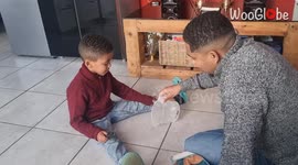 Creative cleaning: Dad's quick thinking makes a water spill disappear