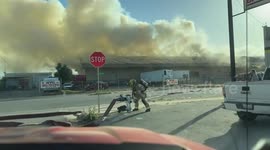 USA: Blaze Engulfs Bakersfield Commercial Structure: Intensive Firefighting Efforts Underway