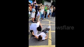 Overjoyed student accidentally knocks over mother outside exam hall in China