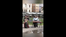 Flash mob playing traditional Chinese music in Latvia
