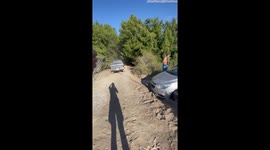 Trying to Tow A Stuck Car By The Bumper