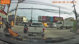 Truck door swings open and hits oncoming car at junction